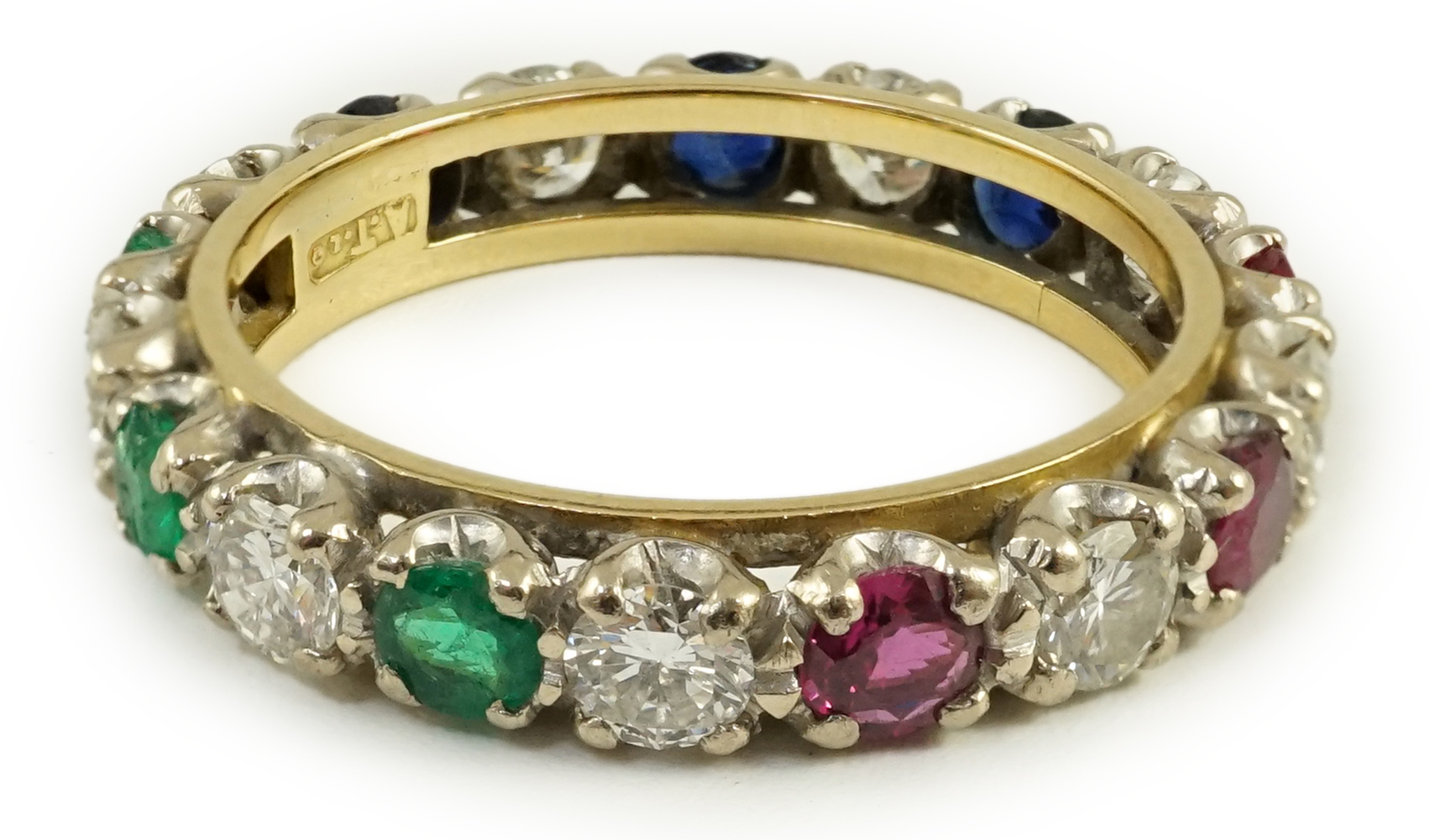 A modern 18ct gold, ruby, sapphire, emerald and diamond set full eternity ring